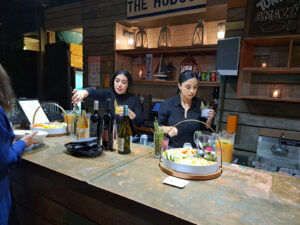 event coordinators at The Hudson preparing food and drink for a milestone celebration